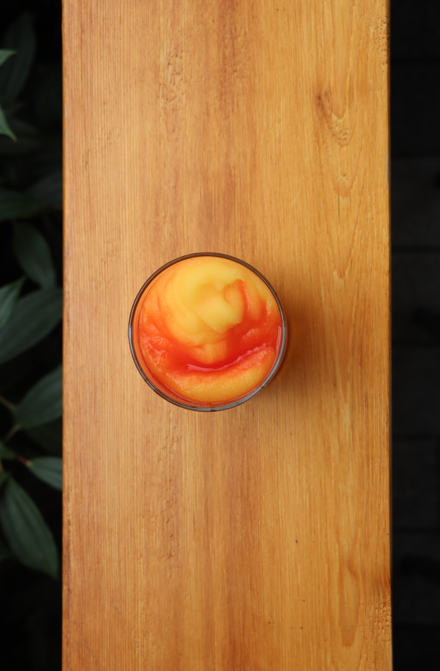 Bellini cocktail on a wooden bar