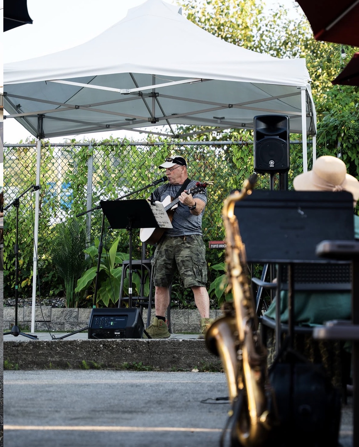 Outdoor open mic performer on the patio
